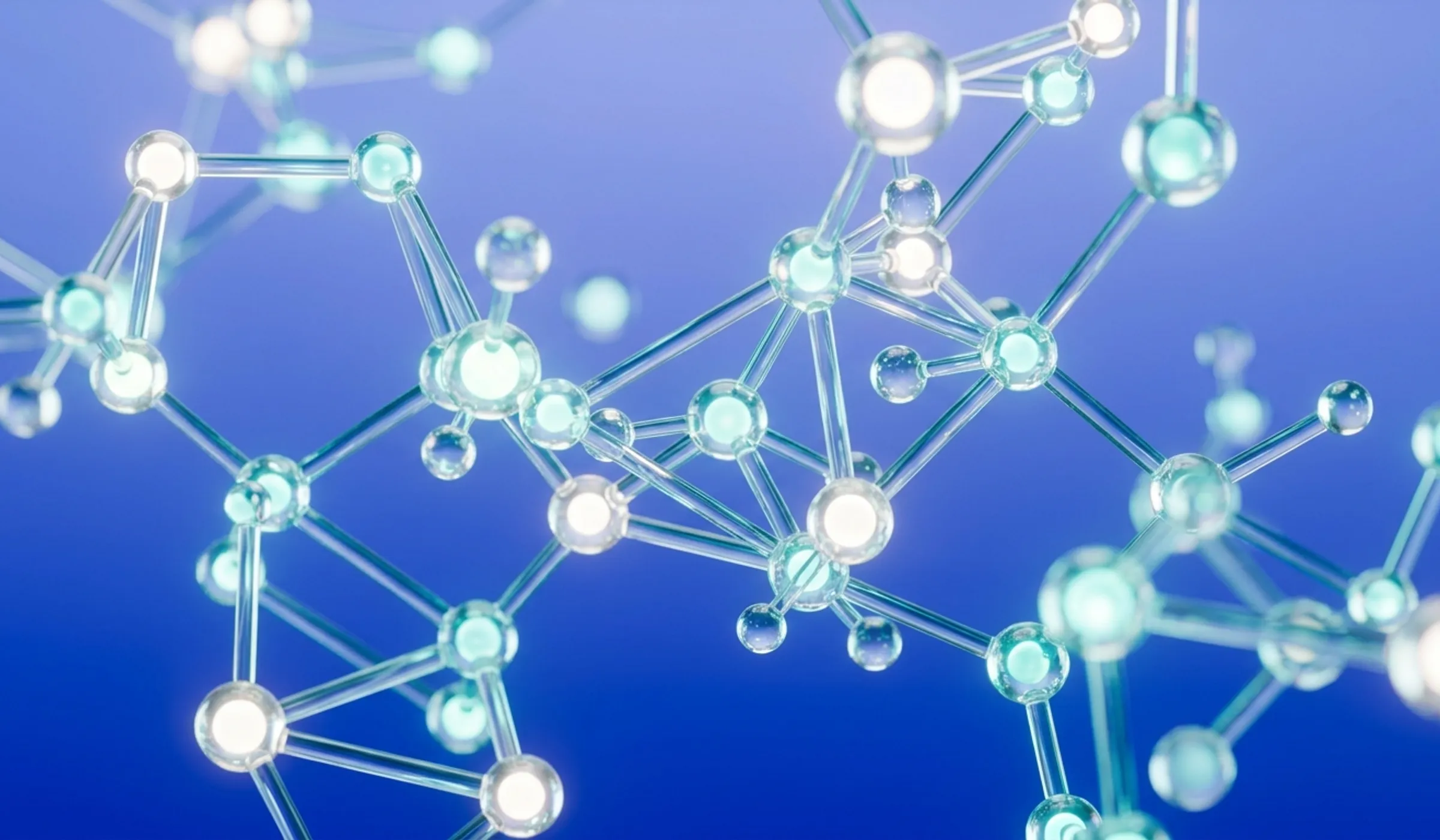 Translucent 3D crystal and glass molecular structures on an electric royal blue studio gradient